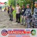 Babinsa Koramil 0825/17 Muncar dan Warga Desa Kumendung Gotong Royong Bersihkan Pantai Sempadan