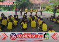 Serda Iwan dari Kodim 0825/Banyuwangi Latih PBB Siswa SD Negeri 2 Singotrunan