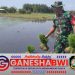 Meski Berpuasa, Babinsa Koramil 0825/01 Banyuwangi Tetap Semangat Dampingi Petani Tanam Padi Meski Berpuasa, Babinsa Koramil 0825/01 Banyuwangi Tetap Semangat Dampingi Petani Tanam Padi
