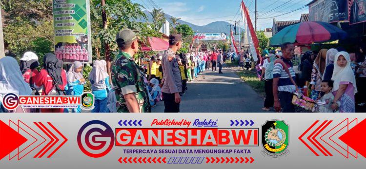 Babinsa Koramil 0825/20 Songgon Dukung Jalan Sehat Peringatan HUT Ke-28 Desa Sumberarum