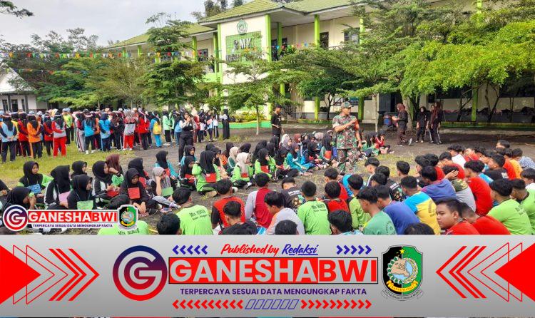 Babinsa Koramil Songgon Latih 413 Siswa Baru SMK Nurut Taqwa dengan Materi Wasbang dan PBB