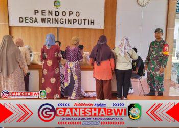 Babinsa Koramil 0825/17 Muncar Kawal Penyaluran 20 Kg Beras untuk 507 Warga Wringin Putih