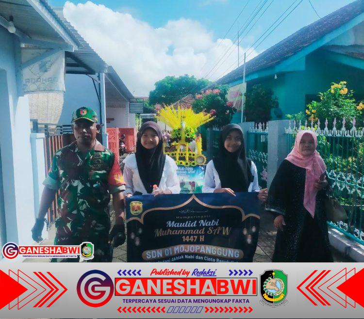 Babinsa Mojopanggung Dampingi Kirab Maulid Nabi Muhammad SAW, Perkuat Karakter Anak Sejak Dini Babinsa Mojopanggung Dampingi Kirab Maulid Nabi Muhammad SAW, Perkuat Karakter Anak Sejak Dini