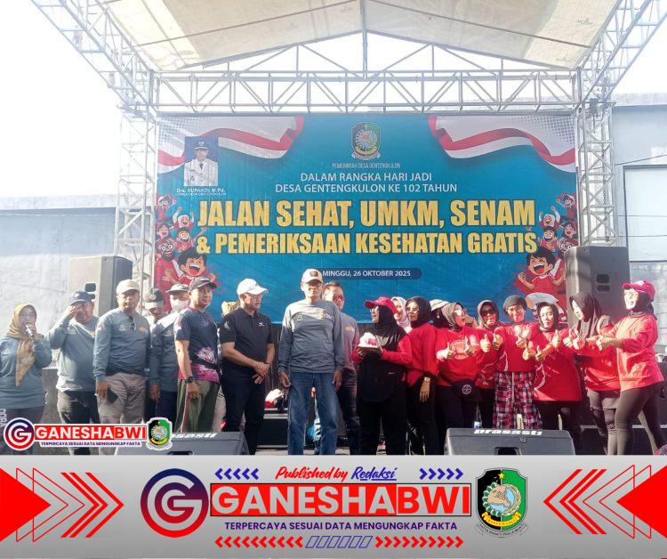 Anggota Koramil 0825/04 Genteng Ikut Jalan Sehat Meriahkan HUT ke-102 Desa Genteng Kulon