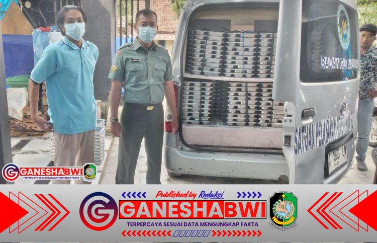 Babinsa Koramil Gambiran Kawal Distribusi Makanan Bergizi ke Sekolah, Pastikan Anak Terpenuhi Gizi